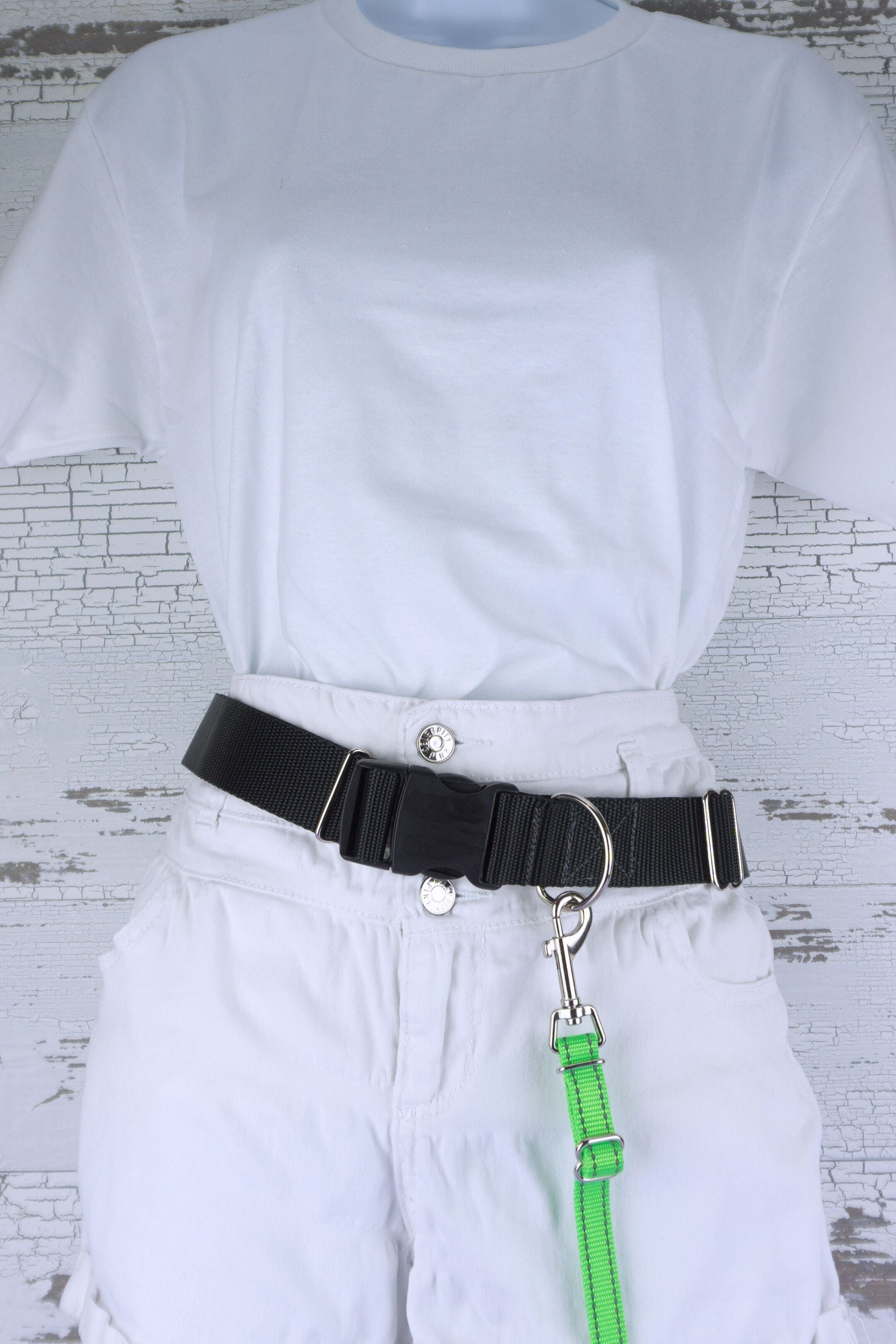 Reflective adjustable length hands free leash for small dog shown in a reflective neon green webbing clipped to a leash belt.