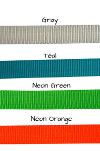 one and one half inch wide webbing is also available in gray, teal, neon green, or neon orange.