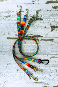 Patterned adjustable length hands free leashes for medium to large dogs shown here in three fun patterns and various hardware options in a flat, swirl lay.