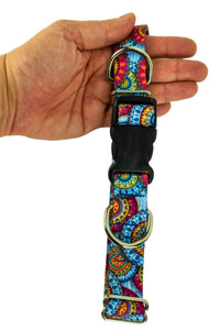 Light weight hands free leash belt held in the hand of an adult to show the scale of the belt hardware and the patterned webbing.