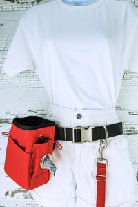 Heavy duty hands free leash belt in black webbing, shown on a mannequin with an attached red leash and a red treat pouch with poop bag dispenser.