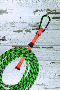 The side release buckle slides up and down the webbing for a snug fit on any size long line or leash bundle.