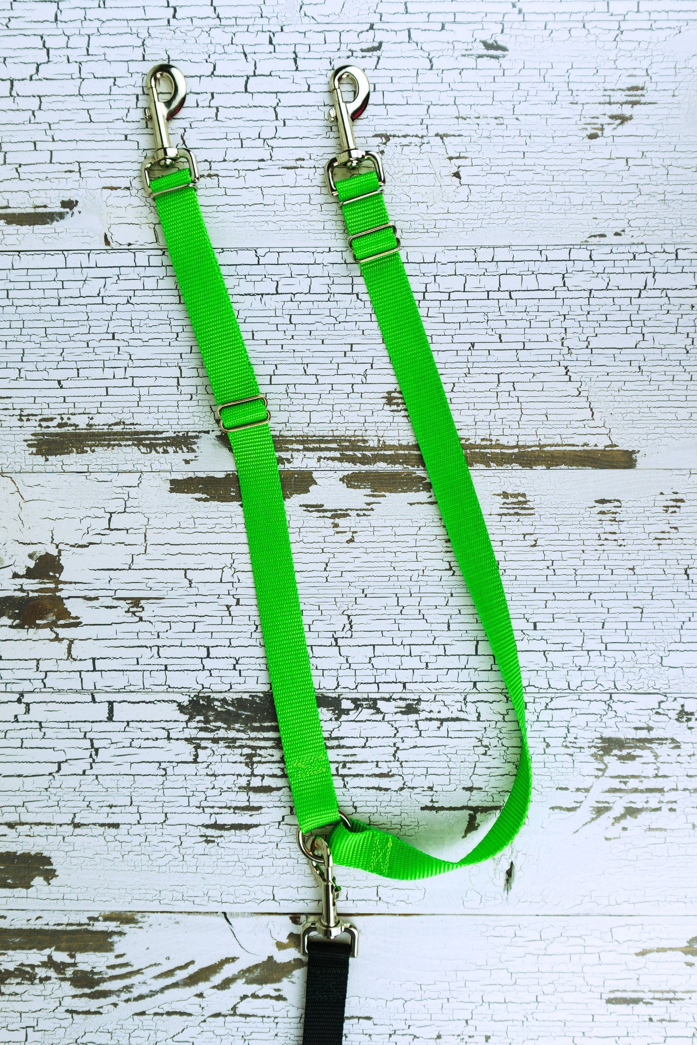 Heavy duty double backup strap shown in a neon green.