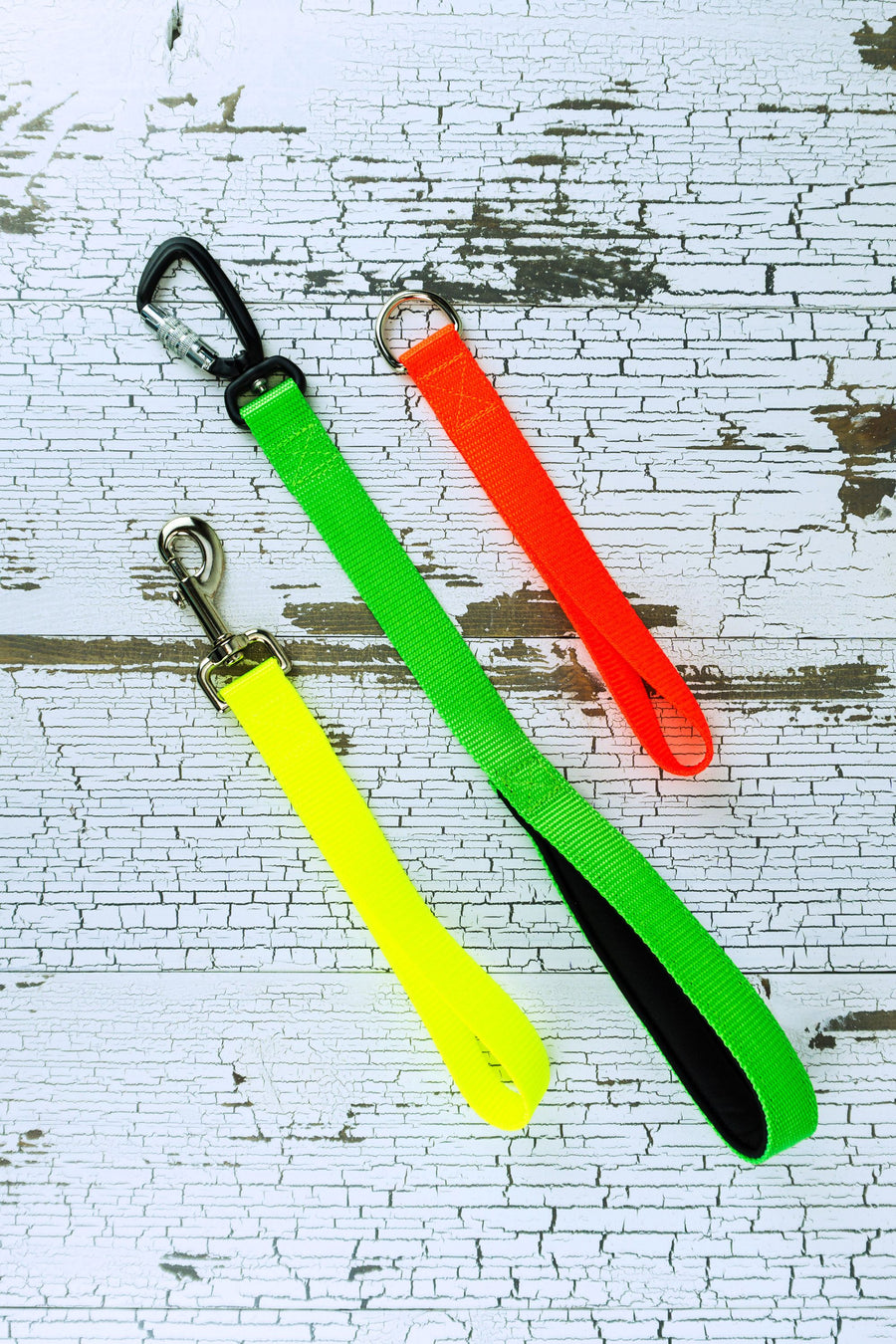Neon leash handles are available in 3 hardware styles, two lengths, and padded or unpadded options.
