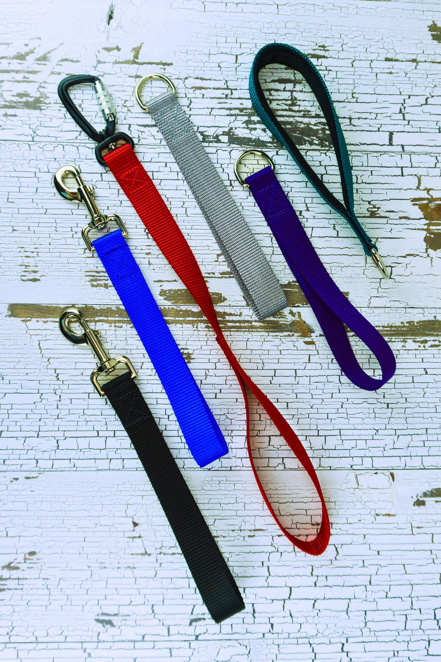 Leash handles are available in 3 hardware styles, two lengths, and padded or unpadded options.