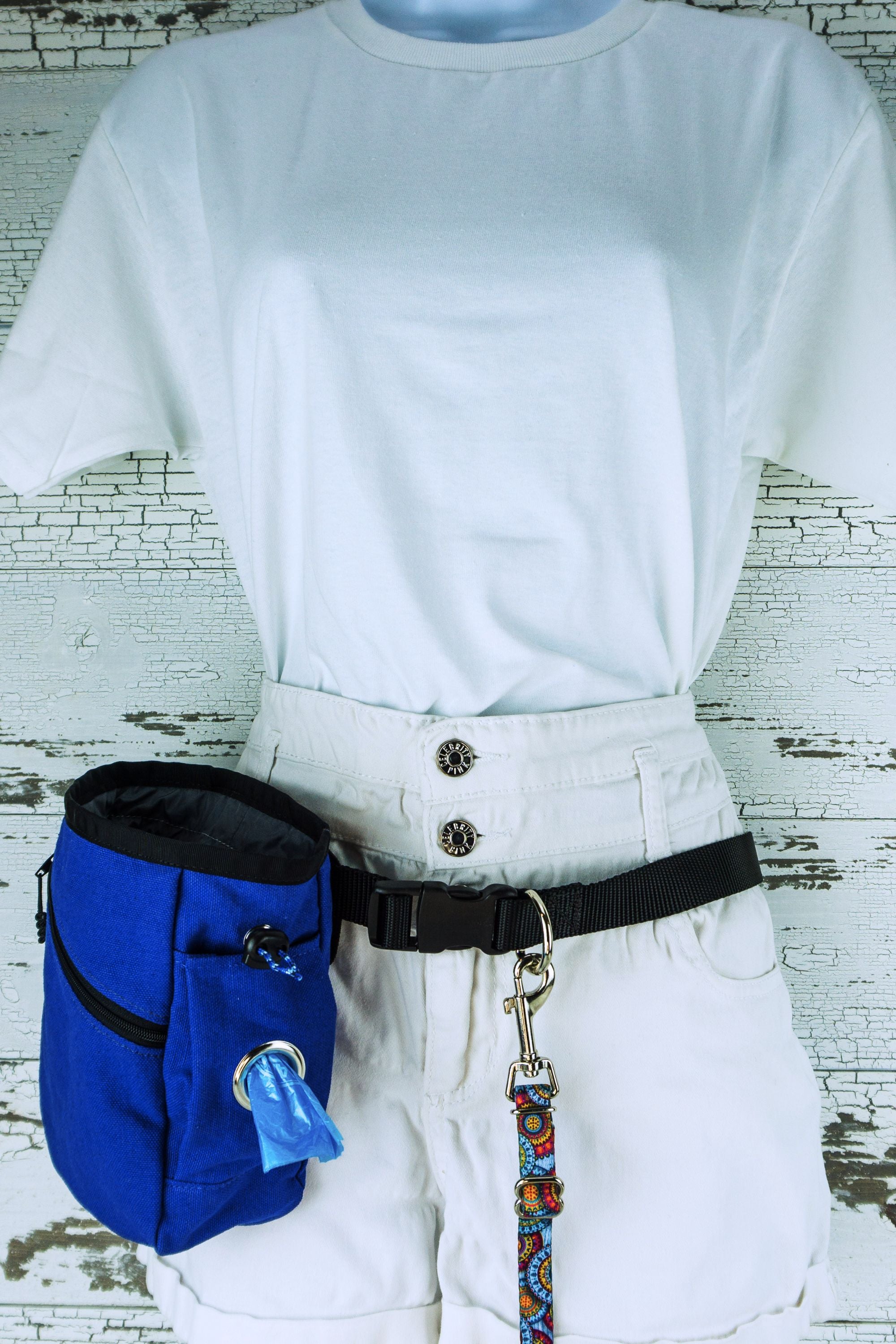 Light weight hands free leash belt in black webbing, shown on a mannequin with an attached sky mandala patterned leash and a blue treat pouch with poop bag dispenser.