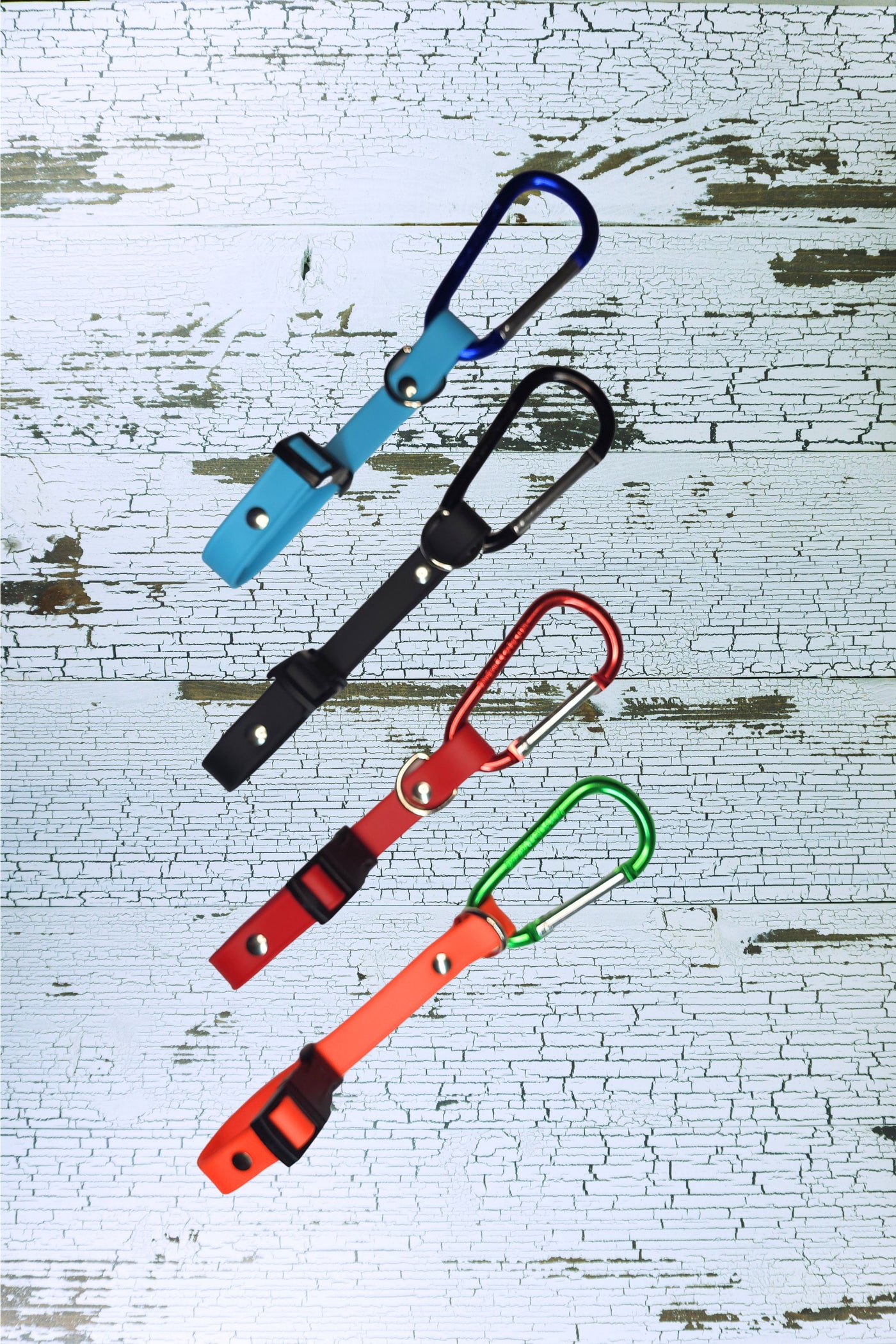 Light weight carabiners and waterproof biothane long line keepers available in four colors.