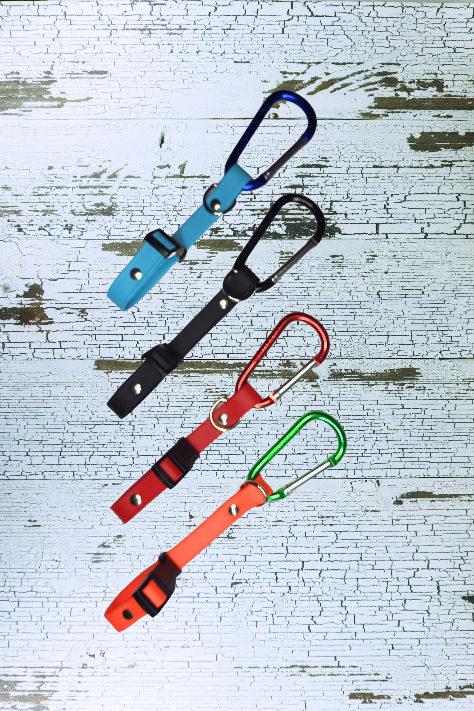 Light weight carabiners and waterproof biothane long line keepers available in four colors.