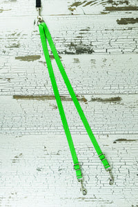 Light weight leash coupler for small dogs shown in neon green.
