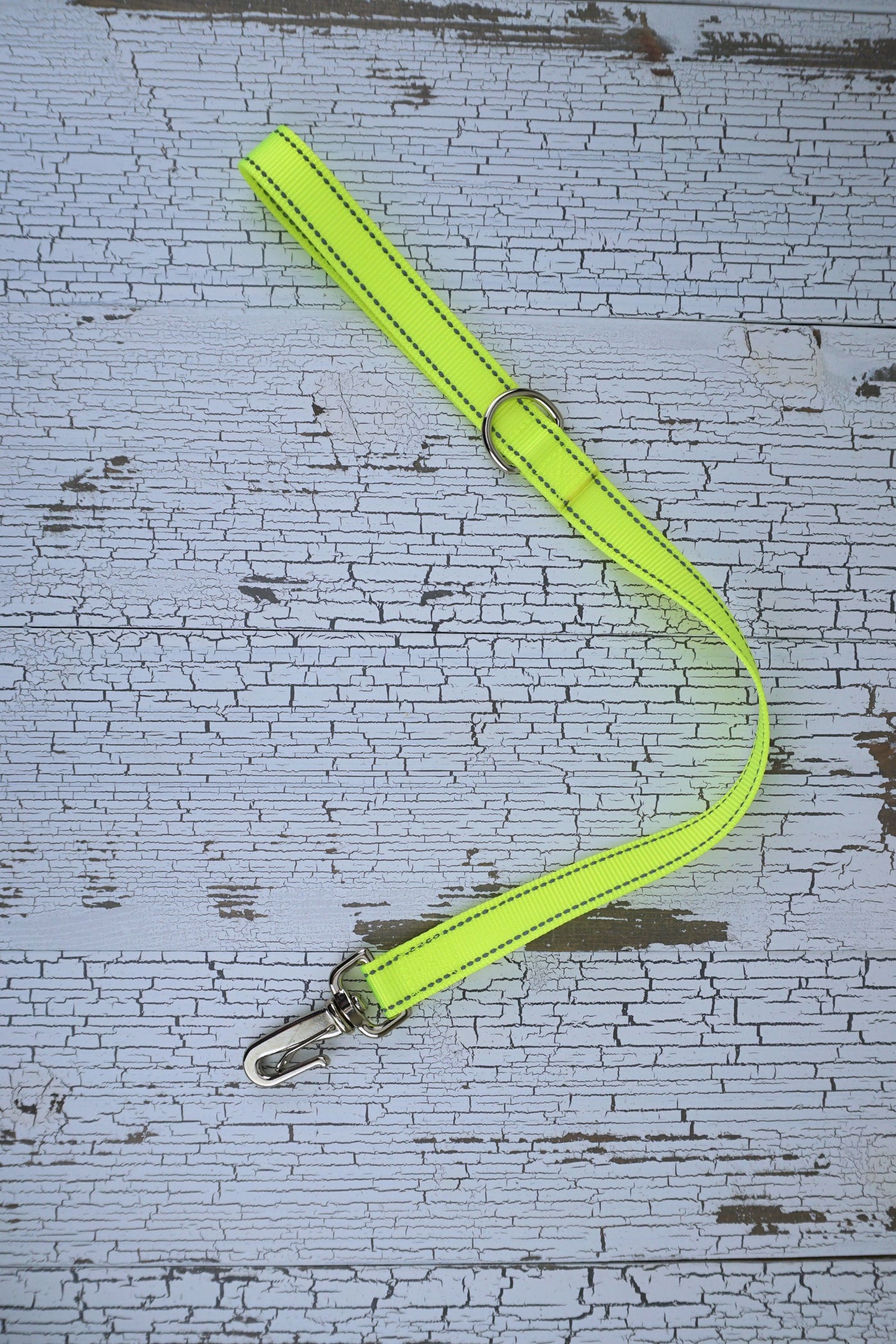 two foot long leash in reflective neon yellow with a gooseneck clip.