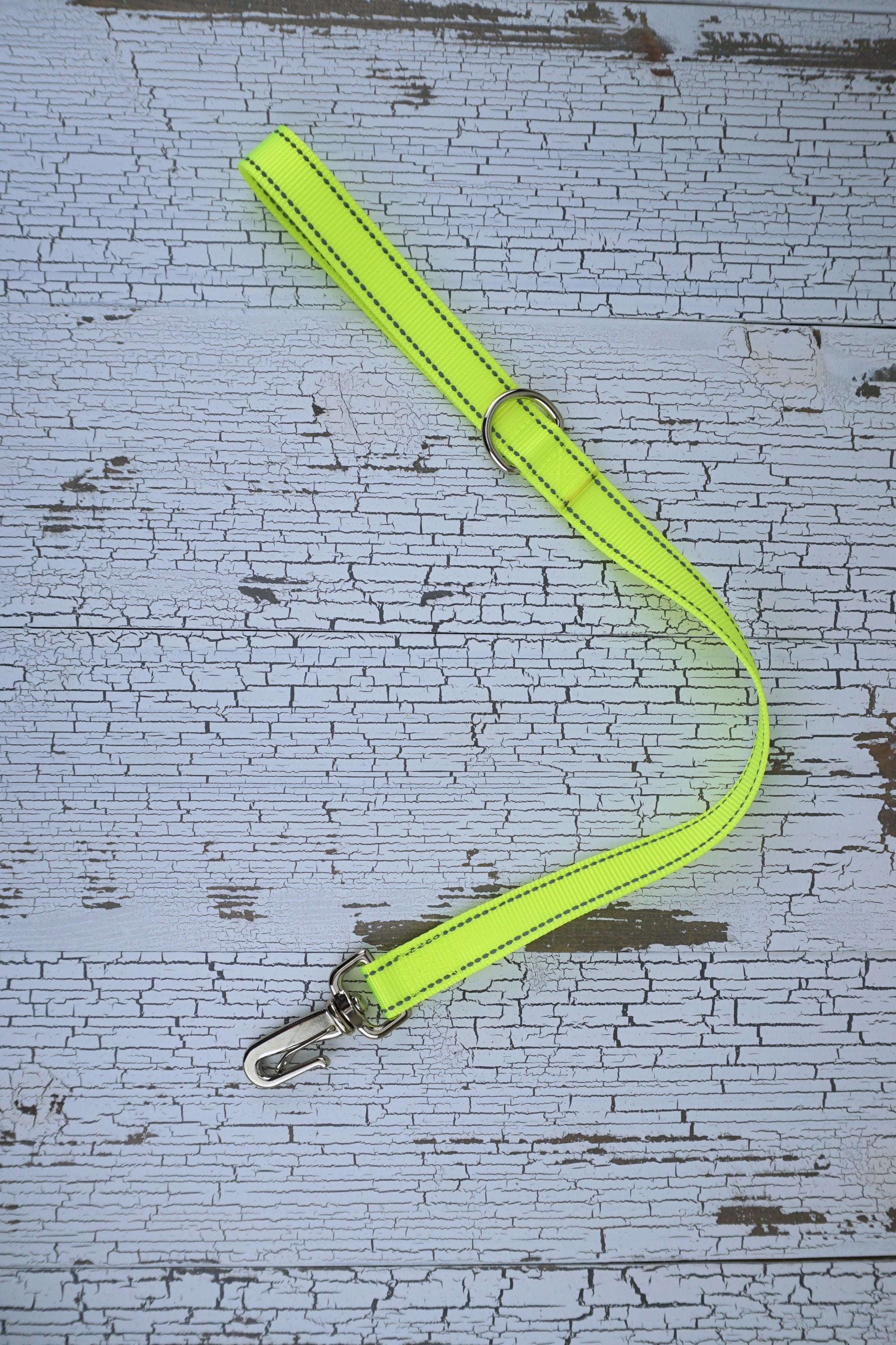 two foot long leash in reflective neon yellow with a gooseneck clip.
