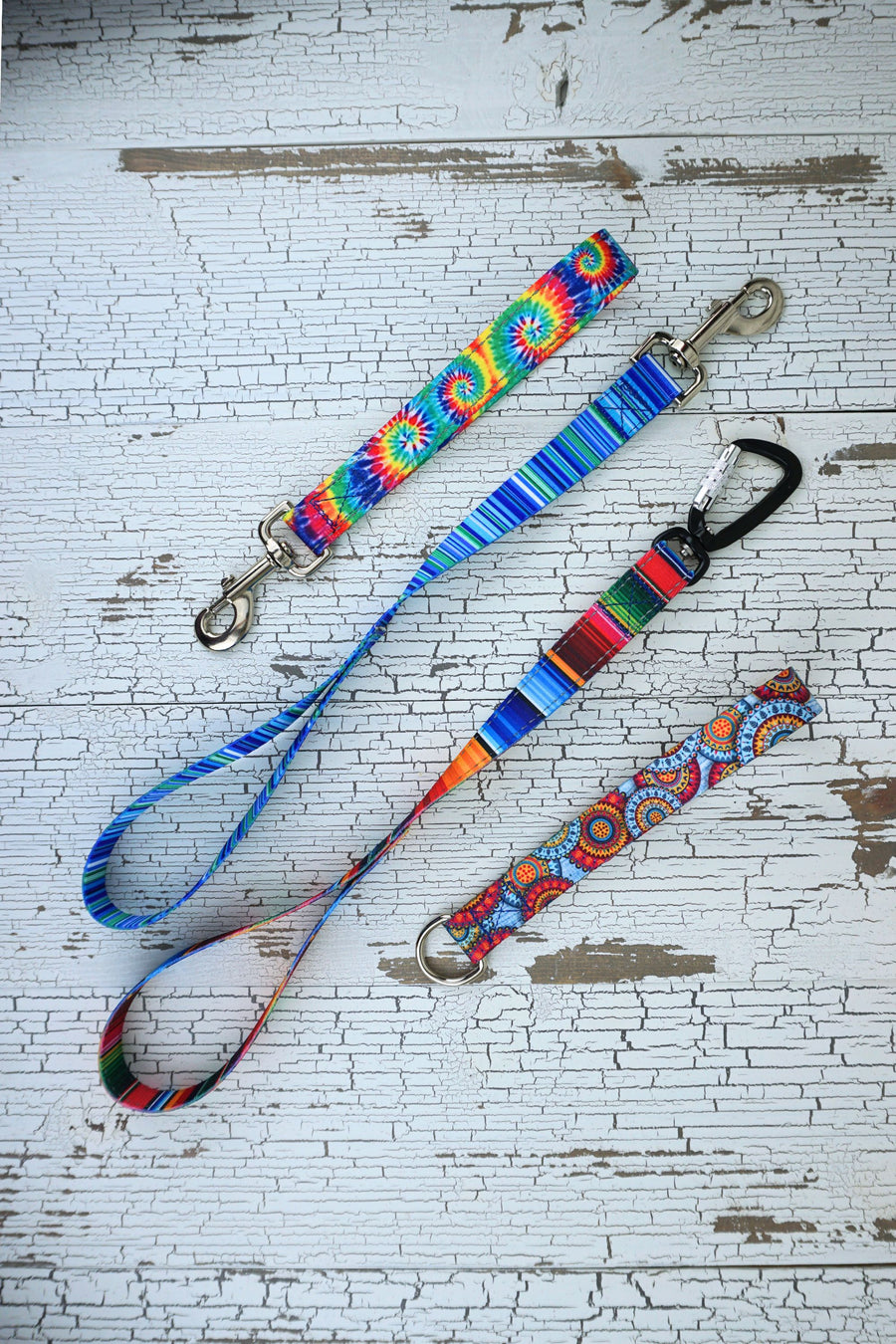 leash handles in two length of sublimated polyester webbing in 4 patterns.