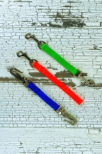 Standard backup straps are shown in a flat lay, highlighting the two different styles and two different hardware options.